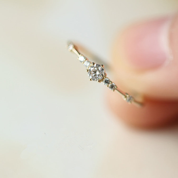 S925 sterling silver plated with 14K gold 7 tiny diamond rings