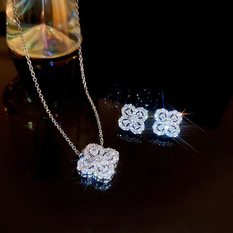 Silver needle hollow zircon flower earring necklace set