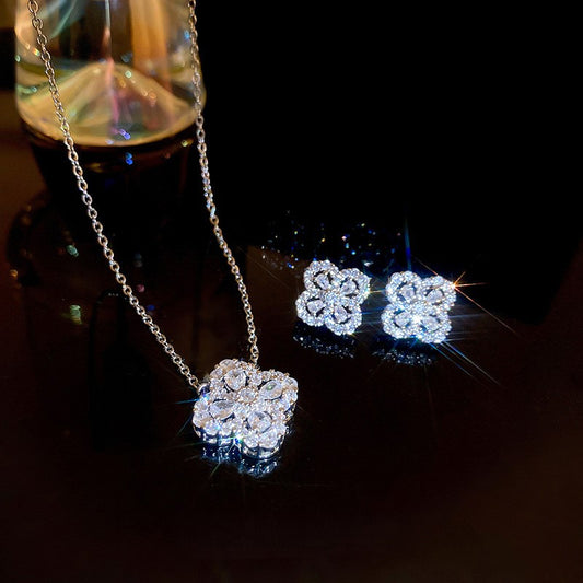 Silver needle hollow zircon flower earring necklace set