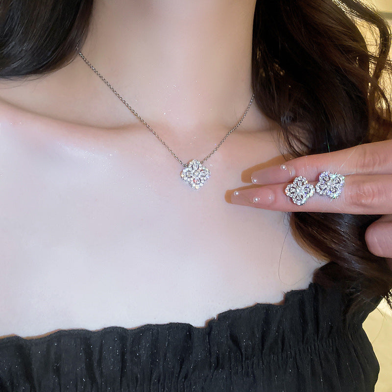 Silver needle hollow zircon flower earring necklace set
