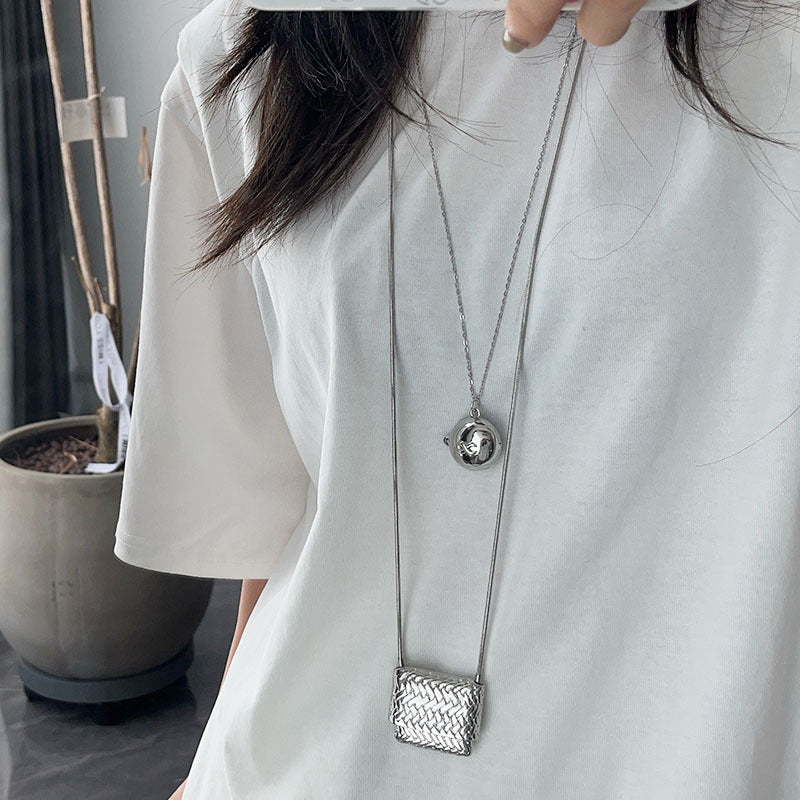 Silver braided bag necklace