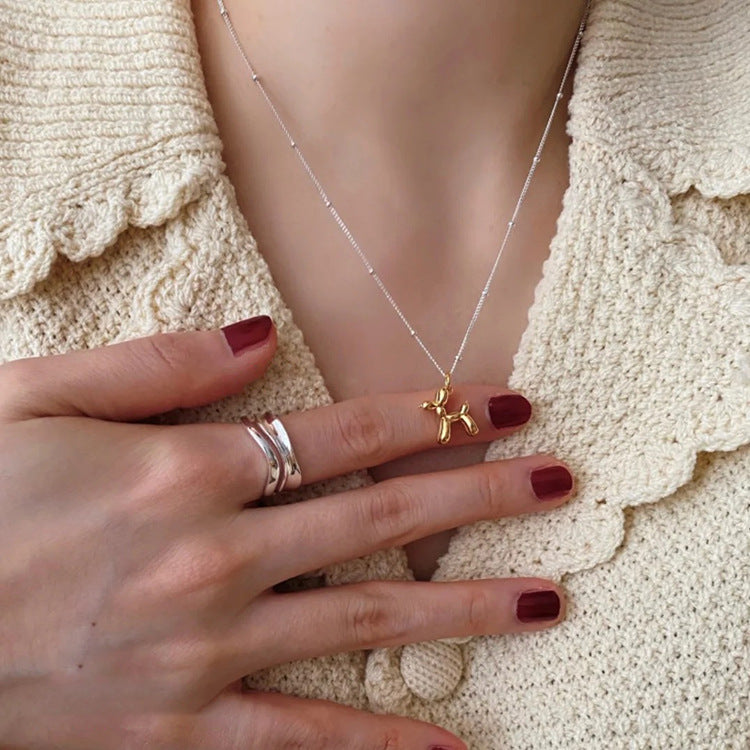 Metal balloon dog pendant necklace