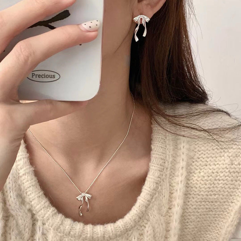 S925 sterling silver bow tassel earrings