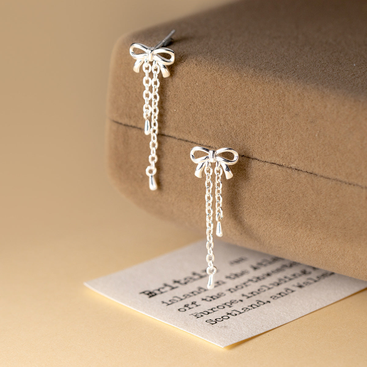 S925 sterling silver bow tassel earrings