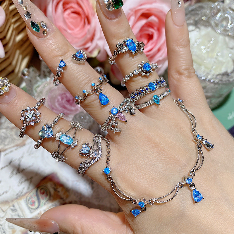 Super Flash Sea Blue Zircon Ring with 18K Gold Plating