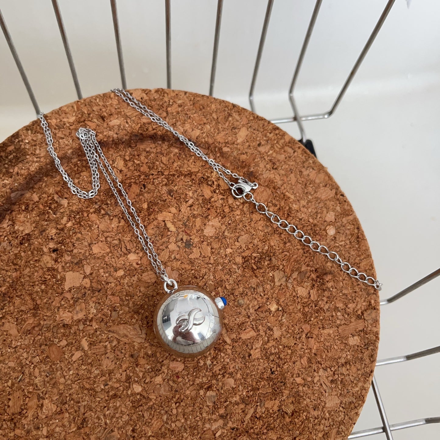Silver braided bag necklace