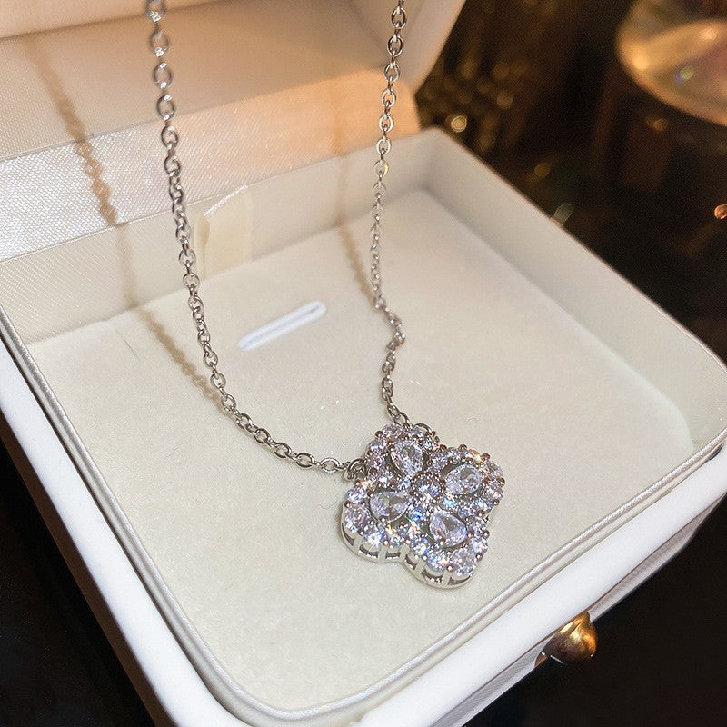 Silver needle hollow zircon flower earring necklace set
