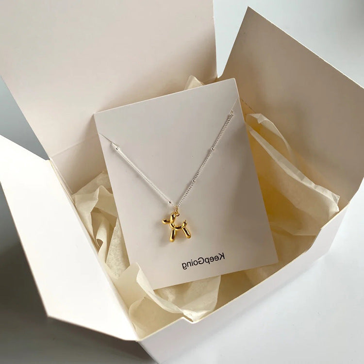 Metal balloon dog pendant necklace