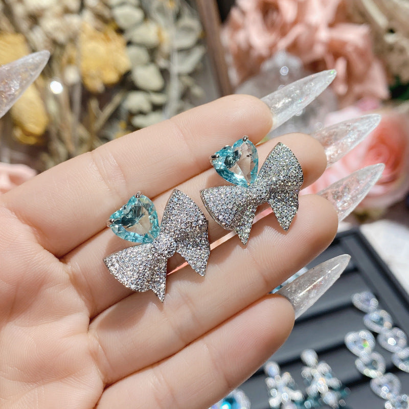 Aquamarine plated 18K gold love bow earrings