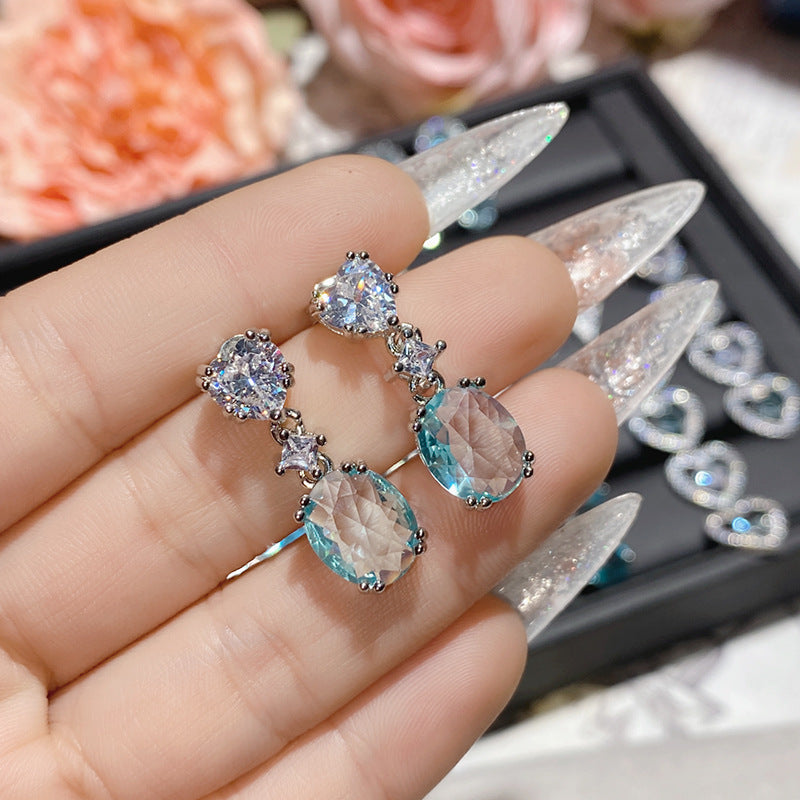 Aquamarine plated 18K gold love bow earrings