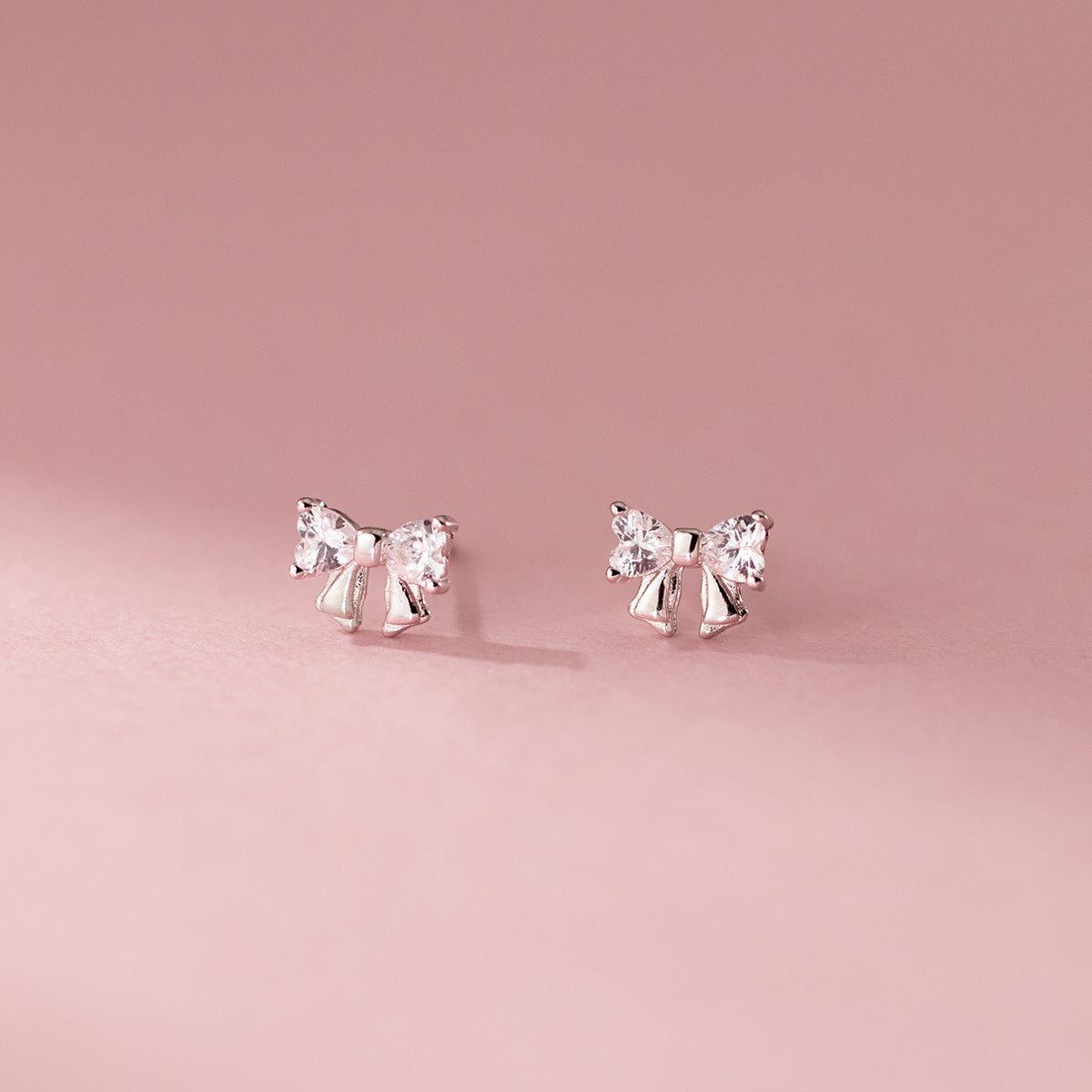 S925 sterling silver studded bow earrings