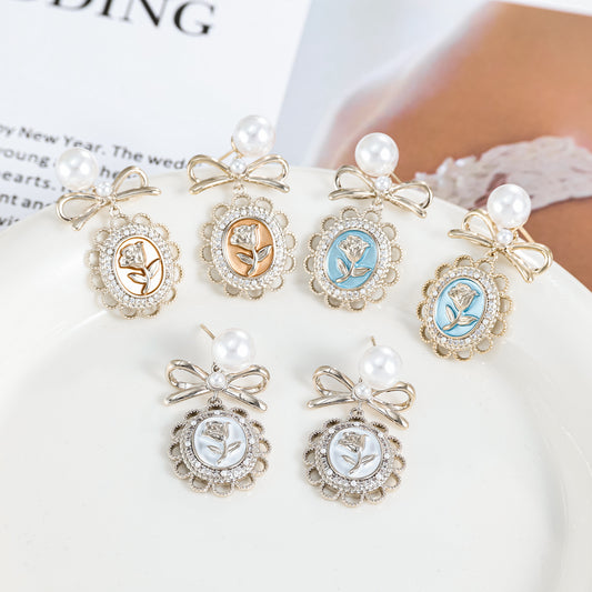 925 silver needle real gold plated pearl bow rose earrings