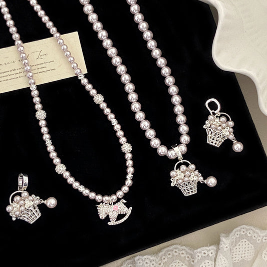Manta rose Swarovski pearl basket necklace