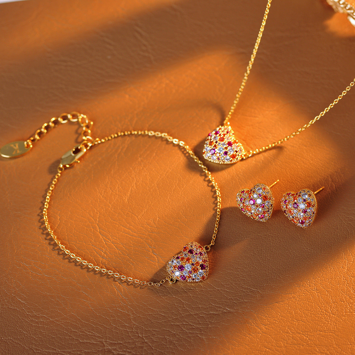 Love necklace bracelet earrings set with pink zircon