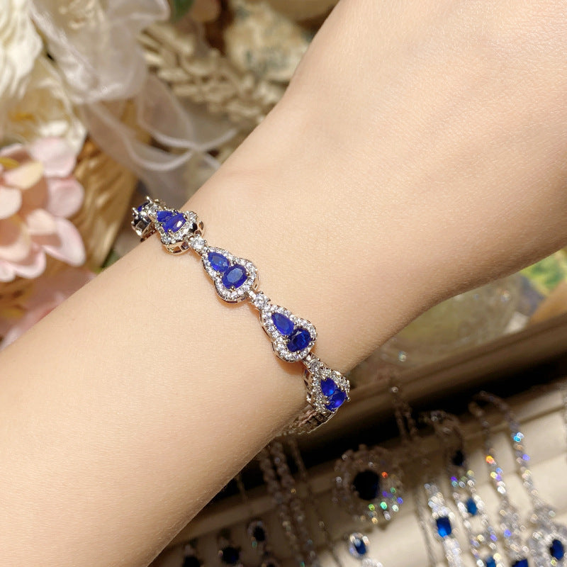 Imitation natural sapphire gold-plated studded ring earrings necklace bracelet