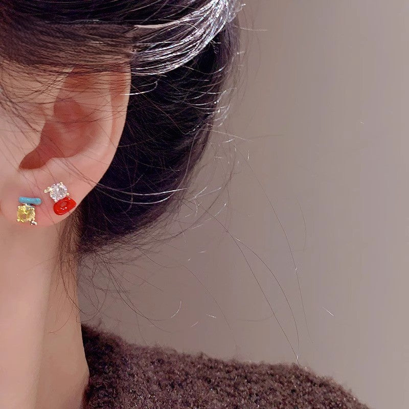 Zircon diamond-encrusted drop oil color earrings