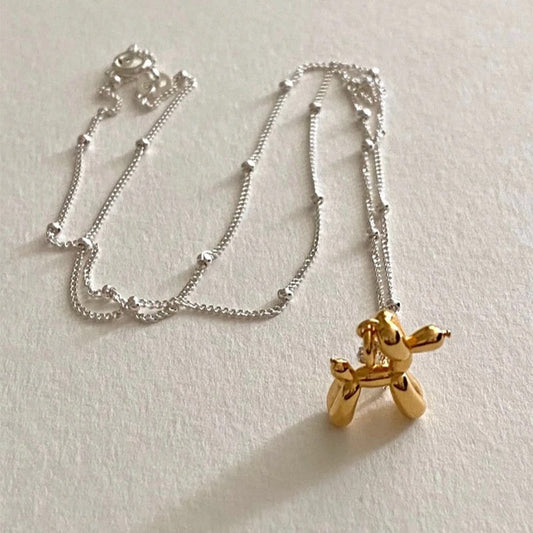 Metal balloon dog pendant necklace