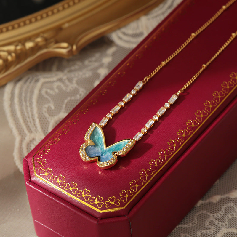 Blue enamel butterfly necklace earrings