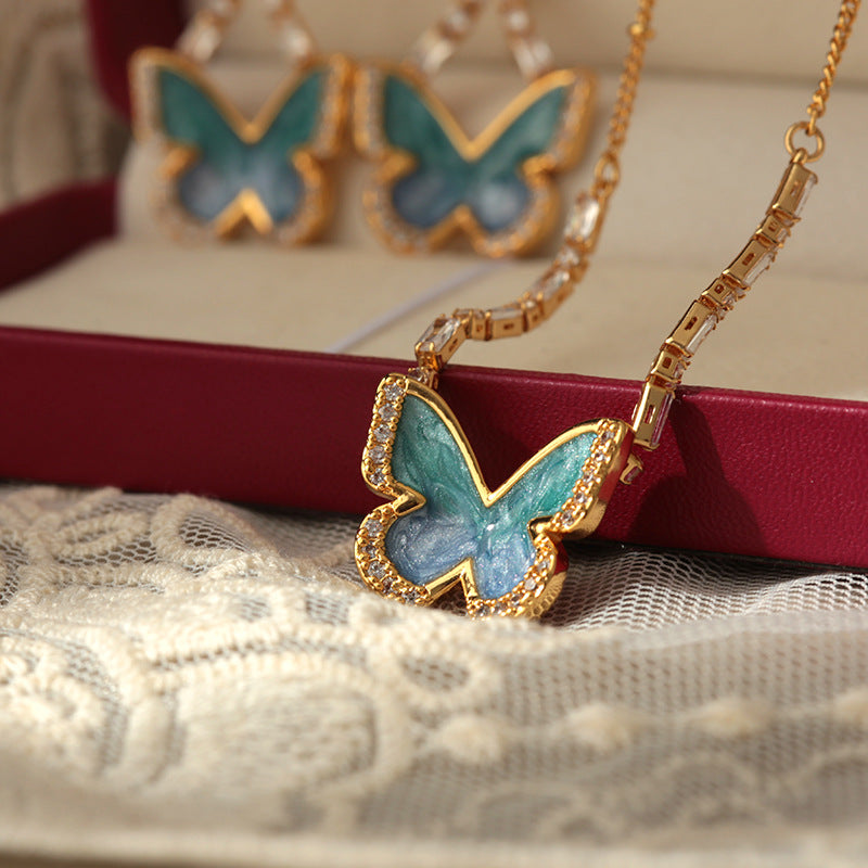 Blue enamel butterfly necklace earrings