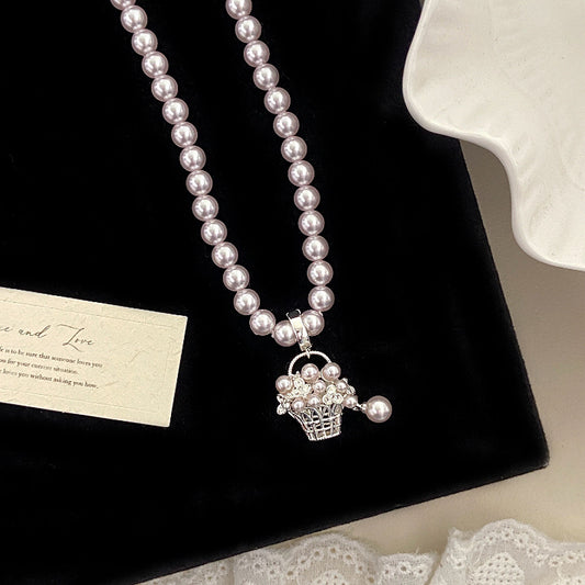Manta rose Swarovski pearl basket necklace