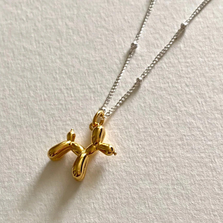 Metal balloon dog pendant necklace