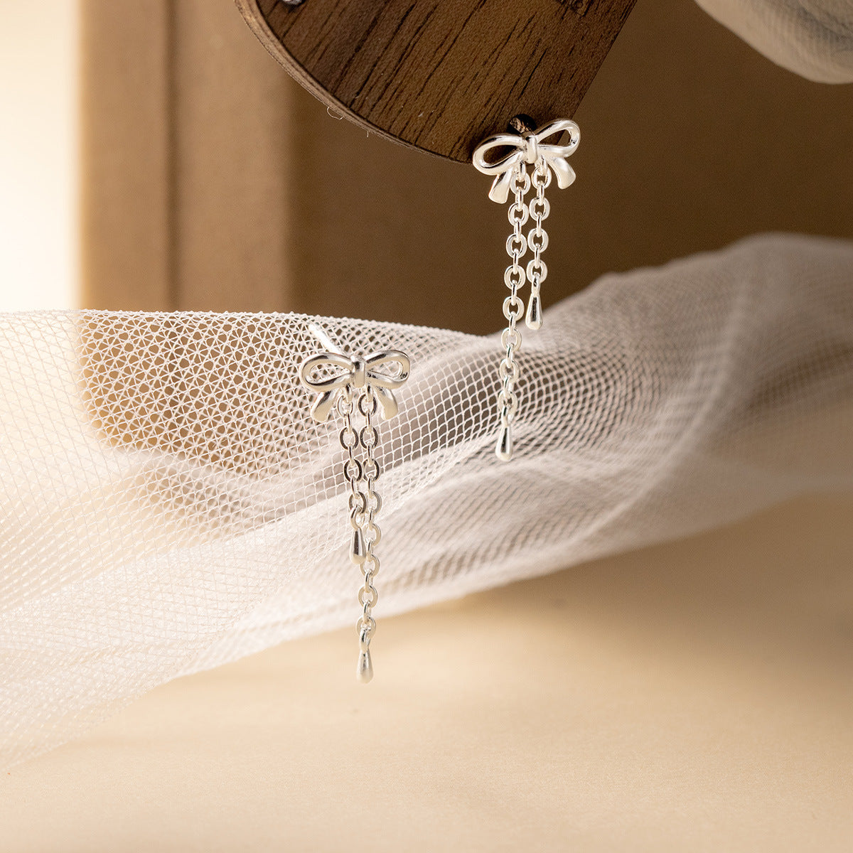 S925 sterling silver bow tassel earrings