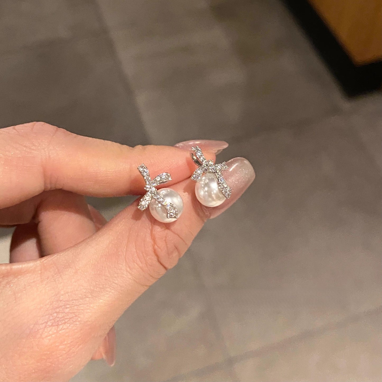 925 silver needle Pearl bow earrings inlaid with zircon