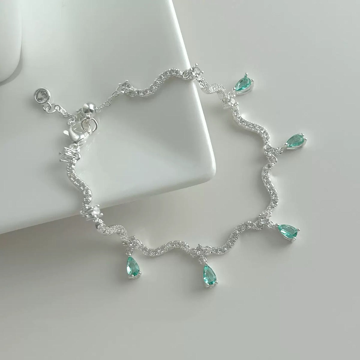 Micro‑Paved Teardrop Green Crystal Silver Bracelet