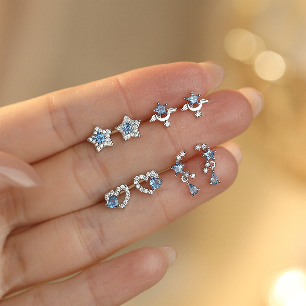 S999 Sterling Silver Earrings with Blue Spinel and White Zircon Plated in Rhodium