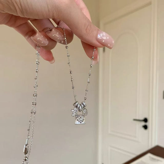 Wire drawing craft running ring cross lock bag necklace