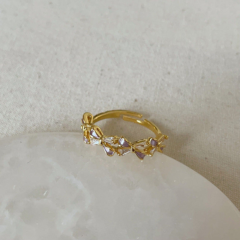 Dropping butterfly flower opening ring