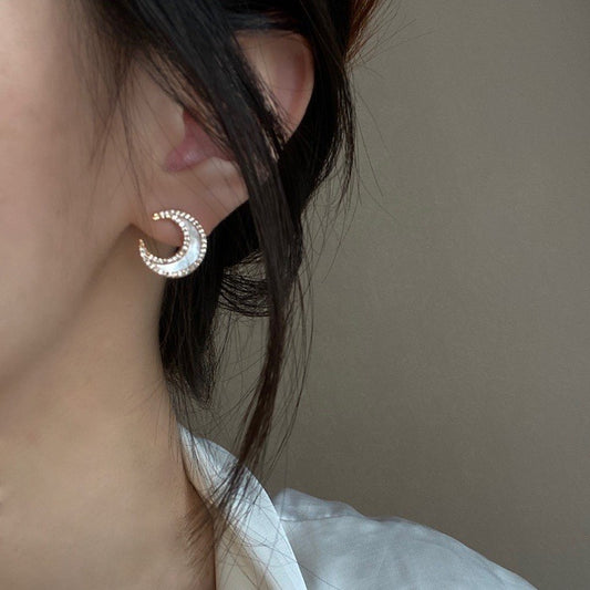 Moon studded shell earrings