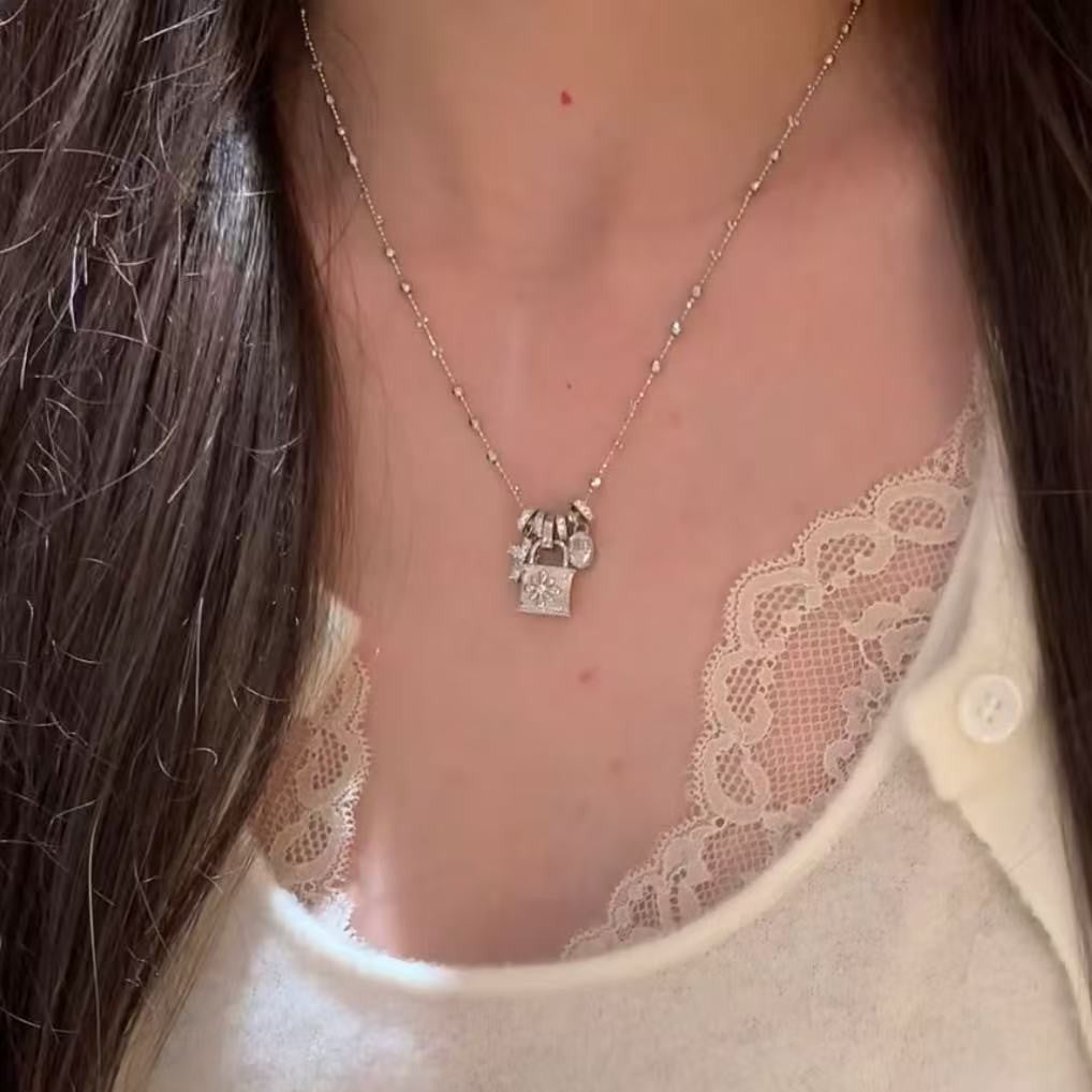 Wire drawing craft running ring cross lock bag necklace