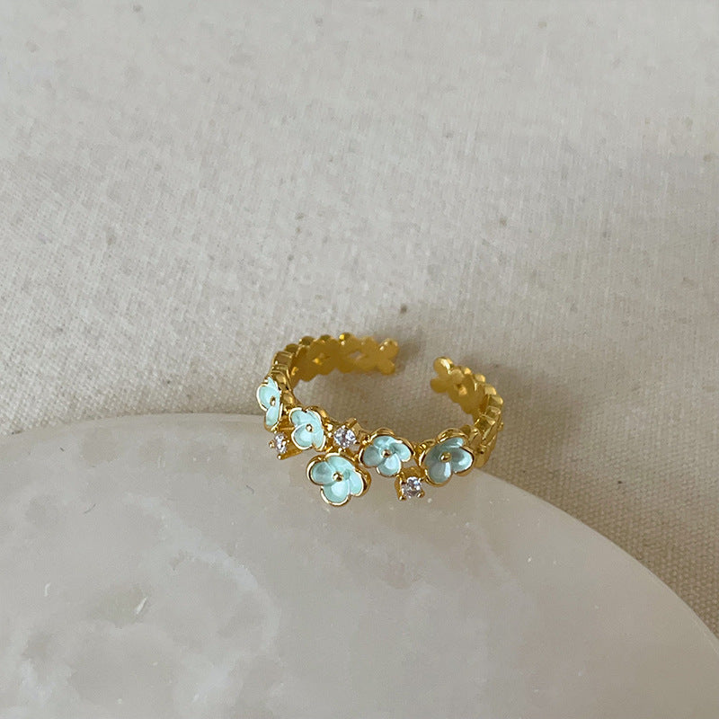 Dropping butterfly flower opening ring