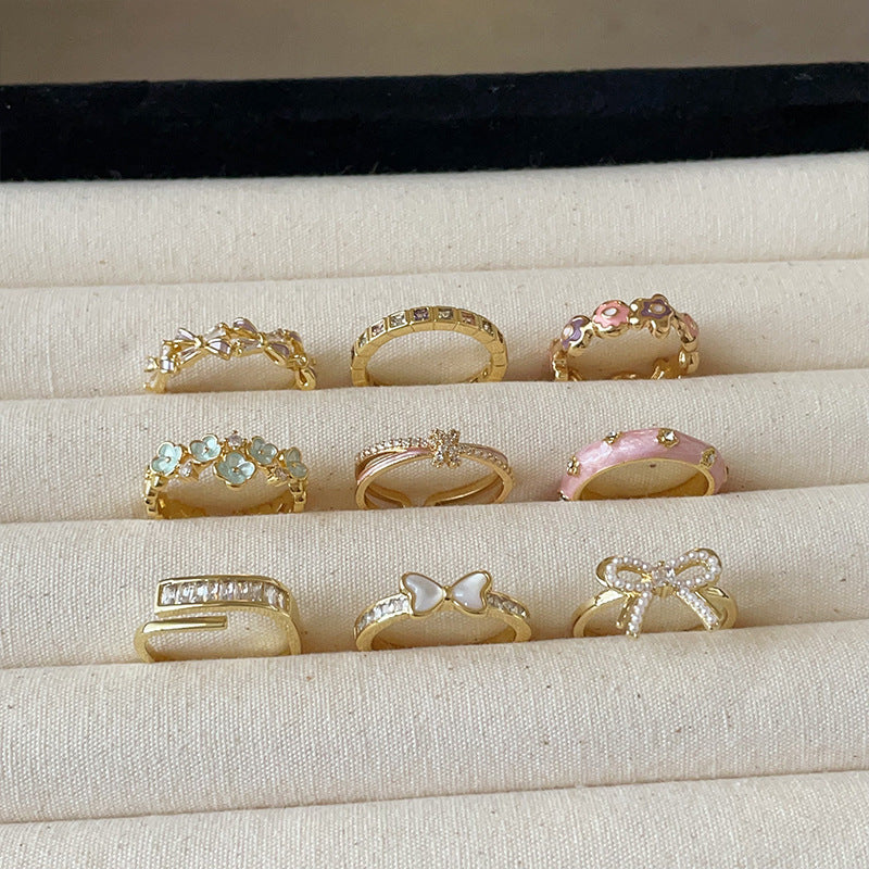 Dropping butterfly flower opening ring