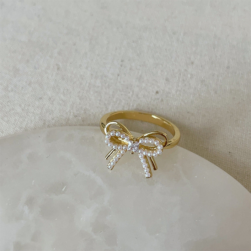 Dropping butterfly flower opening ring